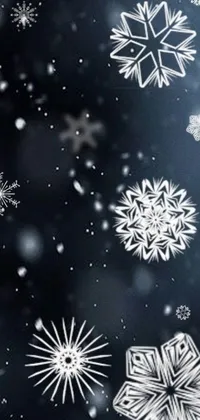 This phone live wallpaper boasts a beautiful black and white rendition of snowflakes against a midnight theme background