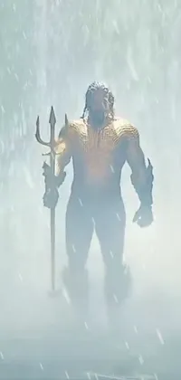 This live wallpaper for phones features Aquaman, the superhero and king of the underwater city of Atlantis standing in the rain holding a spear