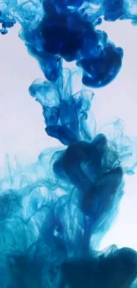 Enhance the look of your phone screen with this stunning blue underwater ink live wallpaper