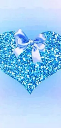 This live phone wallpaper boasts a beautiful blue glitter heart with a bow, presented against a stunning photo and digital art background of a horse, greenery, and an "X" mark