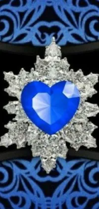 This live phone wallpaper showcases a stunning blue heart adorned with sparkling diamonds, set against a sleek black background