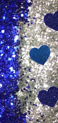 Experience the stunning blue and silver glitter background live wallpaper with floating hearts and mesmerizing animations for your phone