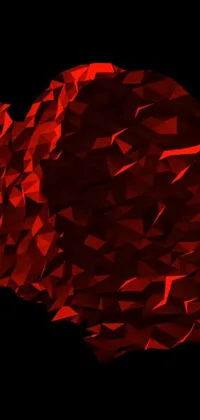 Get mesmerized with a captivating live wallpaper for your phone consisting of a unique heart design made of tiny triangles on a black backdrop