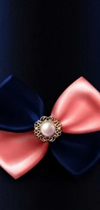 Looking for a stunning phone live wallpaper? Look no further than this vibrant pink and blue bow tie design