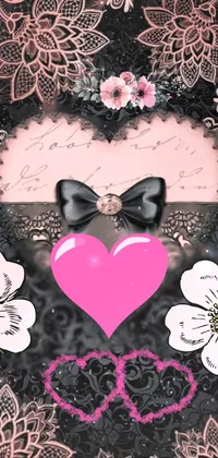 This phone live wallpaper features a stylish black and pink background featuring intricate lace and an elegant bow design