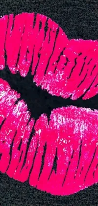 This live wallpaper showcases a close-up shot of pink lipstick against a black background in high resolution