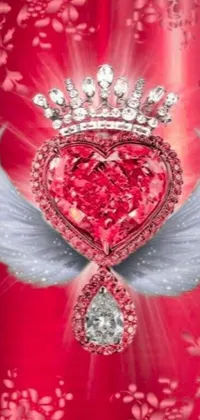 This live wallpaper showcases a heart styled with wings and a crown, all on a bold red background