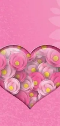This phone live wallpaper showcases a captivating heart filled with lovely pink flowers resting on an elegant pink backdrop