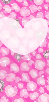 This phone live wallpaper features a pink background with sparkling hearts and gems, rendered digitally for a modern, trendy look