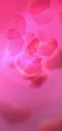 This vibrant phone live wallpaper showcases a bunch of fluttering hearts set against a bright pink backdrop