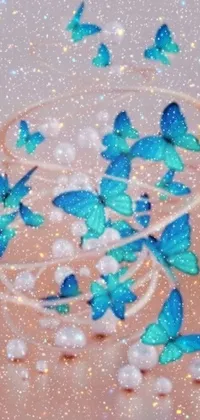 If you're looking for a stunning live wallpaper for your phone, check out this beautiful image of blue butterflies in motion