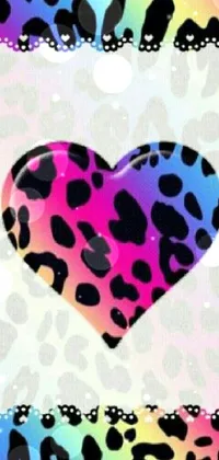 This phone live wallpaper features a heart placed on a leopard print background