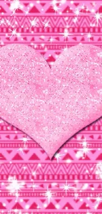 This phone live wallpaper features a cute pink heart on an intriguing pink background with stars