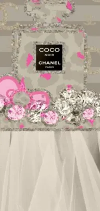 This phone live wallpaper features a beautiful chanel cake design on a rococo-inspired table