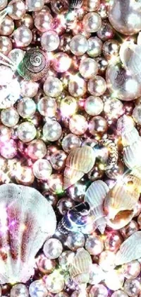 This stunning phone live wallpaper features a striking display of pearls and shells, arranged in a psychedelic and glittering design inspired by the Pearl Frush Tumblr aesthetic