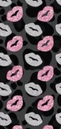 This phone live wallpaper showcases a bold pop art design featuring a pattern of playful lips set against a sleek black background