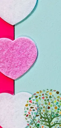 This live wallpaper showcases a delightful design of hearts resting on a pink and blue wall