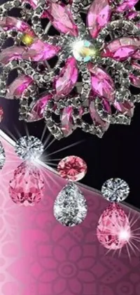 This live wallpaper for your phone displays stunning jewelry on a pretty, pink background