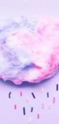 This phone live wallpaper is a playful display of cotton floss and cotton candy clouds