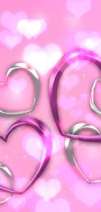 This live phone wallpaper features an enchanting array of purple hearts on a delightful pink background