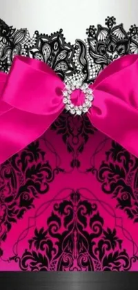 This mobile live wallpaper features a stunning pink and black invitation with a bow, giving it an elegant and fancy touch