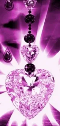Get the gorgeous crystal heart and chain live wallpaper for your phone! This digital rendering is a stunning depiction of a sparkling pink diamond encrusted heart hanging delicately from a chain
