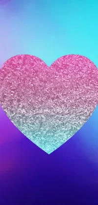 This phone live wallpaper is a gorgeous blend of pink and blue hues with a heart design that pops with pointillism texture