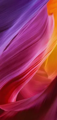 This stunning phone wallpaper features a close-up view of an abstract painting with vibrant red, purple, and yellow hues