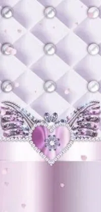 This stunning live wallpaper features a heart with wings, pearls, and purple crystals on a pink background