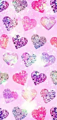 Add a touch of sparkle and romance to your phone's display with this pink and purple live wallpaper