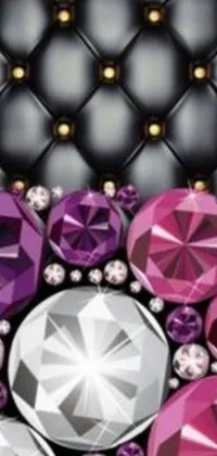 This phone live wallpaper features a stunning digital rendering of various colored diamonds on a black background