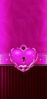 Get this stunning phone live wallpaper! The design features a bright pink background with a metallic heart and keyhole in the center, set against an HD image of a luxurious purple leather dungeon bedroom
