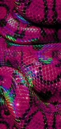 Take a look at this stunning phone live wallpaper that showcases a close-up of a snake skin pattern in silver armor and fuchsia colors
