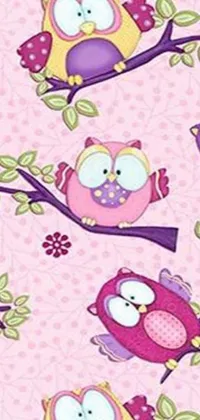 This lively phone live wallpaper showcases a group of adorable owls perched on a tree branch with a pink and purple color scheme