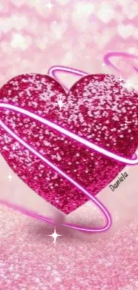 Looking for a stunning live wallpaper for your phone? Look no further than this heartwarming and romantic design! Featuring a colorful heart on a pink background and bursting with neon sparkles, this wallpaper is perfect for adding a touch of love and whimsy to your device