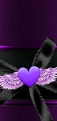 This phone live wallpaper features a purple heart with wings on a purple background