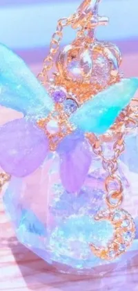 This phone live wallpaper features a mesmerizingly detailed and intricate necklace adorned with colorful crystals and gems
