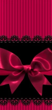 This phone live wallpaper features a stunning pink and black striped background with a cute bow