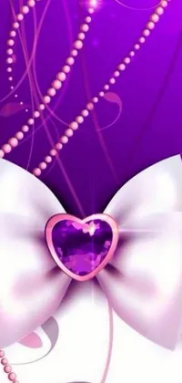 Looking for a lovely live wallpaper for your phone? Look no further than this purple-inspired background with a gorgeous bow and heart design
