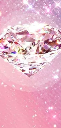 This phone live wallpaper boasts a stunningly close view of a diamond, set against a soft pink digital background