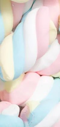 This live wallpaper features a colorful and adorable pile of pastel marshmallows