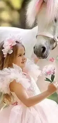 This magical live wallpaper features a white horse and a little girl accompanied by a cute fairy and surrounded by colorful flowers