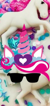 This lively phone live wallpaper showcases a close-up view of a unicorn cake adorned with colorful confetti sprinkles