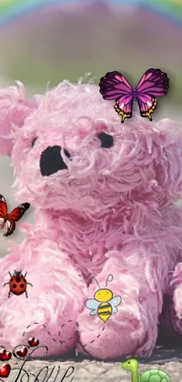 Looking for a fun and playful live wallpaper to brighten up your phone screen? This adorable pink teddy bear is sure to do the trick! With a colorful rainbow backdrop, butterflies, worms and pink bees, this furry art creation is trending on Flickr and guaranteed to make you smile