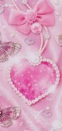 This live wallpaper features a pink background with butterflies, heart, and bejeweled accents