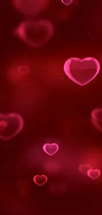 Looking for a dreamy live wallpaper for your phone's home screen? Try the Hearts Live Wallpaper, featuring a charming display of floating hearts in various sizes and shades