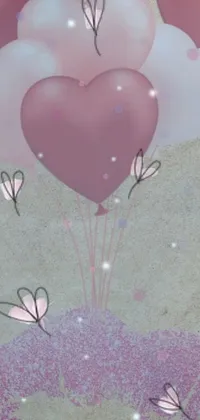 This phone live wallpaper features a heart-shaped bouquet of balloons on a lilac sky background with sand and glitter