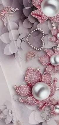 This phone live wallpaper showcases a vibrant flower adorned with delicate pearls and studded earrings