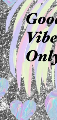 Looking for a stunning live wallpaper for your phone? Check out this black and white photo with the words "good vibes only"! Inspired by Lisa Frank, tumblr, and psychedelic art, this design also features a gorgeous glitter background in silver and cool colors