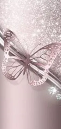 This phone live wallpaper features a charming butterfly in vivid hues of pink and purple, hovering over a stylish background in exquisite shades of pink and silver